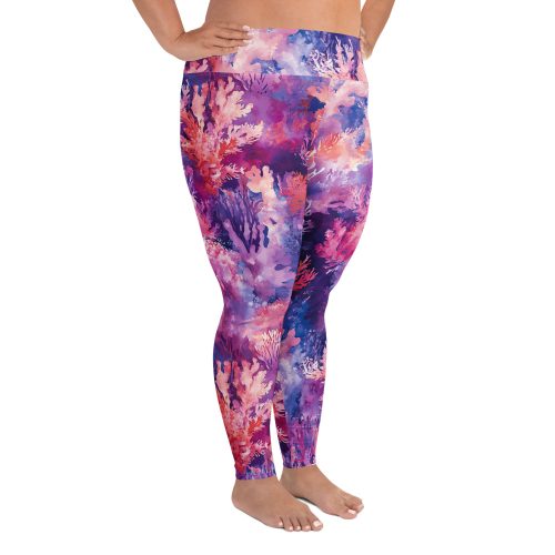 Whispers of the Reef print swim leggings on plus sized model, side view.