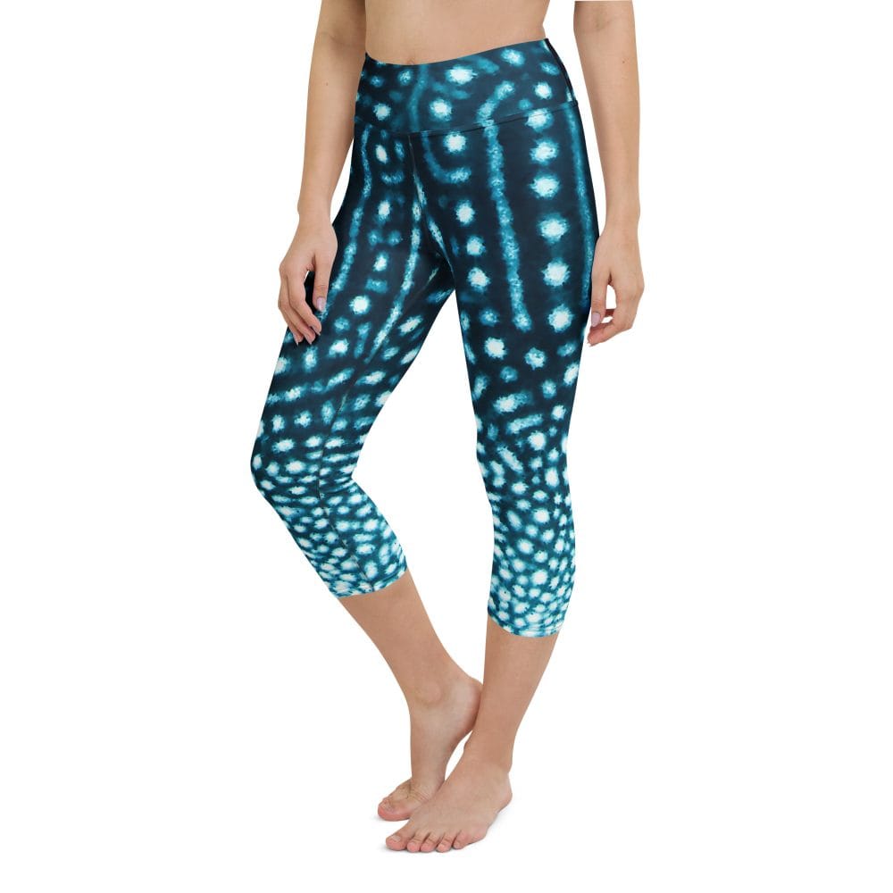 Model posing in the Whale Shark Wanderer Capri leggings.
