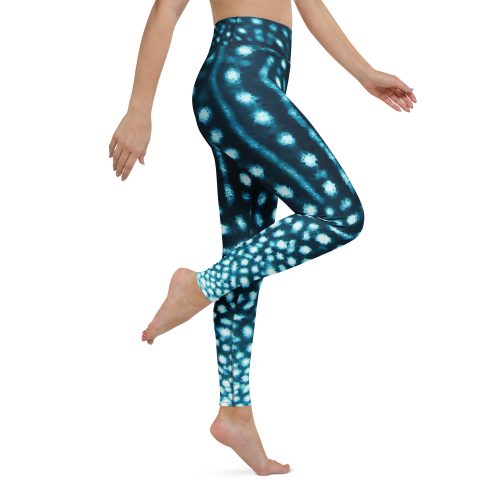 Model in motion, wearing the Whale Shark Wanderer leggings, full-length.
